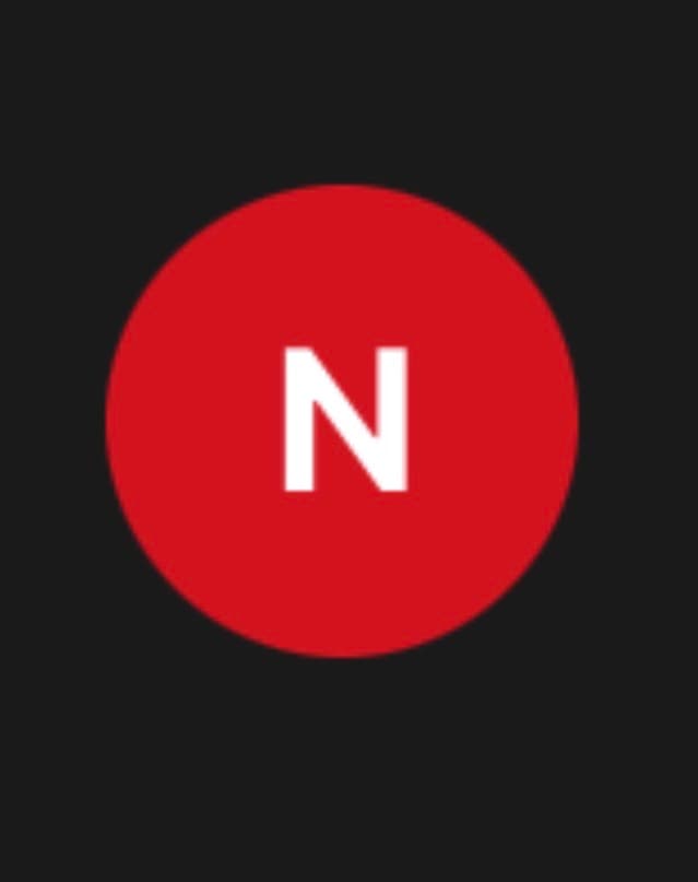 White capital letter N centered inside a red circle against a dark gray background.